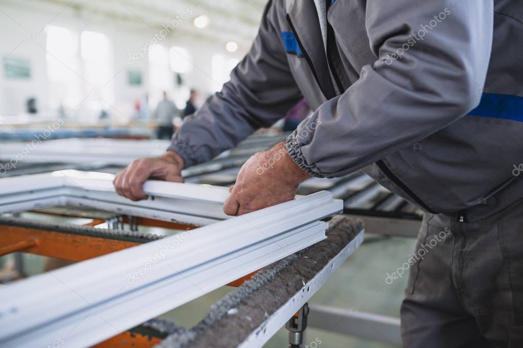 depositphotos_203761058-stock-photo-factory-aluminum-pvc-windows-doors